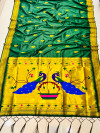 Dark green color paithani silk saree with golden zari weaving work