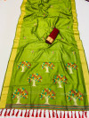 Mehandi green color soft raw silk saree with woven design