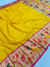 Yellow color paithani silk saree with mina zari border