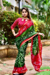 Red and green color soft bandhani silk saree with hand bandhej work