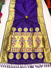 Purple color paithani silk saree with gold zari weaving border