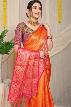 Orange color fancy silk saree with golden zari weaving work