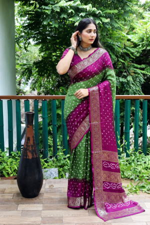 Mahendi Green and purple color bandhej silk saree with zari weaving work