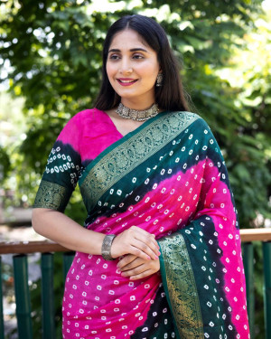 Rani pink and green color bandhej silk saree with zari weaving work
