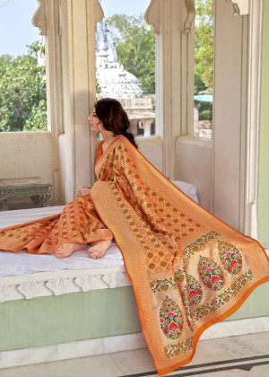 Mustad yellow color paithani silk saree with zari weaving work