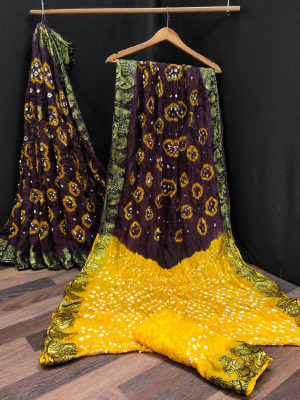 Magenta and yellow color rich bandhani silk saree with jacquard weaving work