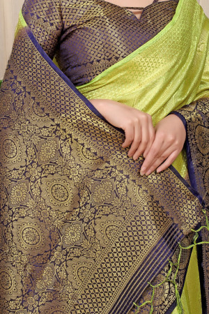 Pista color fancy silk saree with golden zari weaving work