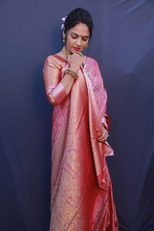 Pink color muslin silk saree with zari weaving work