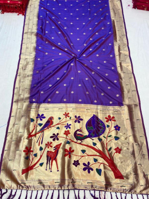 Purple color paithani silk saree with mina weaving zari pallu