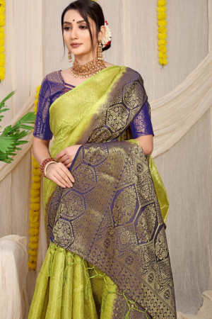 Parrot green color kora muslin silk saree with zari weaving work