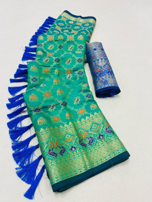 Green color Patola silk saree with zari weaving work
