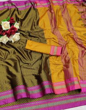 Mustard yellow color cotton silk saree with zari woven work