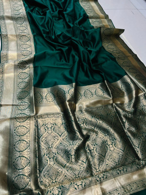 Dark green color soft kanchipuram silk saree with gold zari weaving work