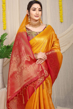 Yellow color fancy silk saree with golden zari weaving work