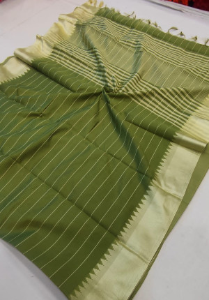 Mehndi green color raw silk saree with woven design
