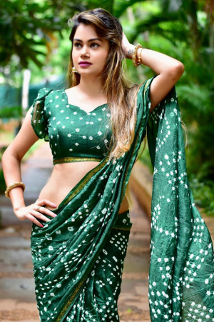 Green color soft bandhani silk saree with hand bandhej work