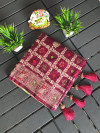 Maroon color dola silk saree with zari woven work