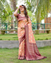 Peach color kanjivaram silk saree with zari weaving work