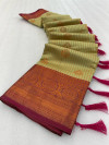 Pista green color kanjivaram silk saree with woven design