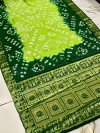 Parrot green and green color bandhej silk saree with zari weaving work