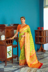 Parrot green color patola silk saree with zari weaving work