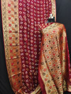 Maroon color bandhani silk saree with hand bandhej work