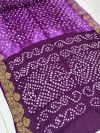 Purple color hand bandhej silk saree with sibori printed work