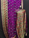 Purple color bandhani silk saree with hand bandhej work