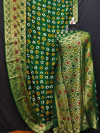 Green color bandhani silk saree with hand bandhej work