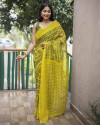 Lemon yellow color linen cotton saree with ikat printed work