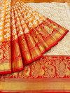 Orange color kanchipuram silk saree with zari weaving work