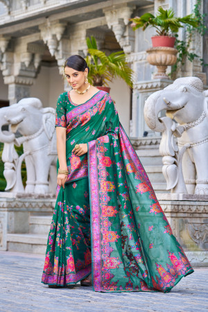 Bottle green color banarasi silk saree with woven design