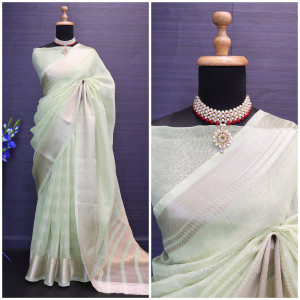 Pista green color soft tussar silk saree with zari weaving border