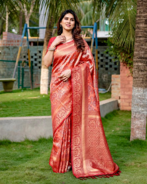 Orange color kanjivaram silk saree with zari weaving work
