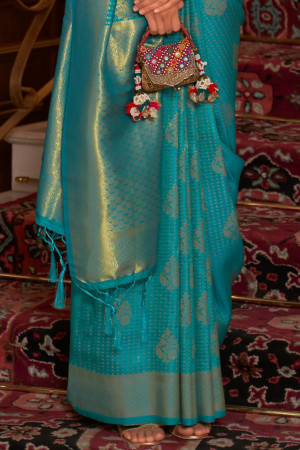 Rama green color kanjivaram silk saree with zari weaving work
