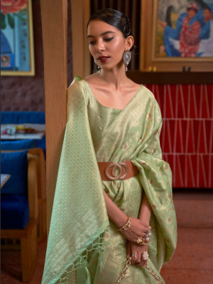 Pista green color katan silk saree with zari weaving work