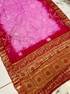 Baby pink and pink color bandhej silk saree with zari weaving work