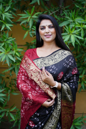 Black color hand bandhej silk saree with bandhani printed work