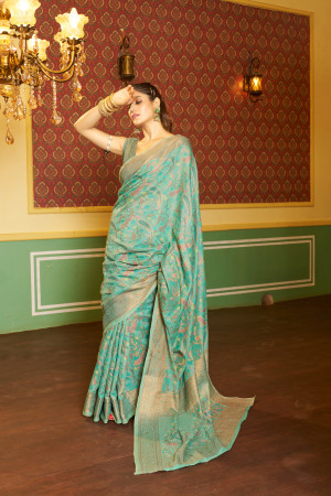 Sea green color soft cotton silk saree with woven design