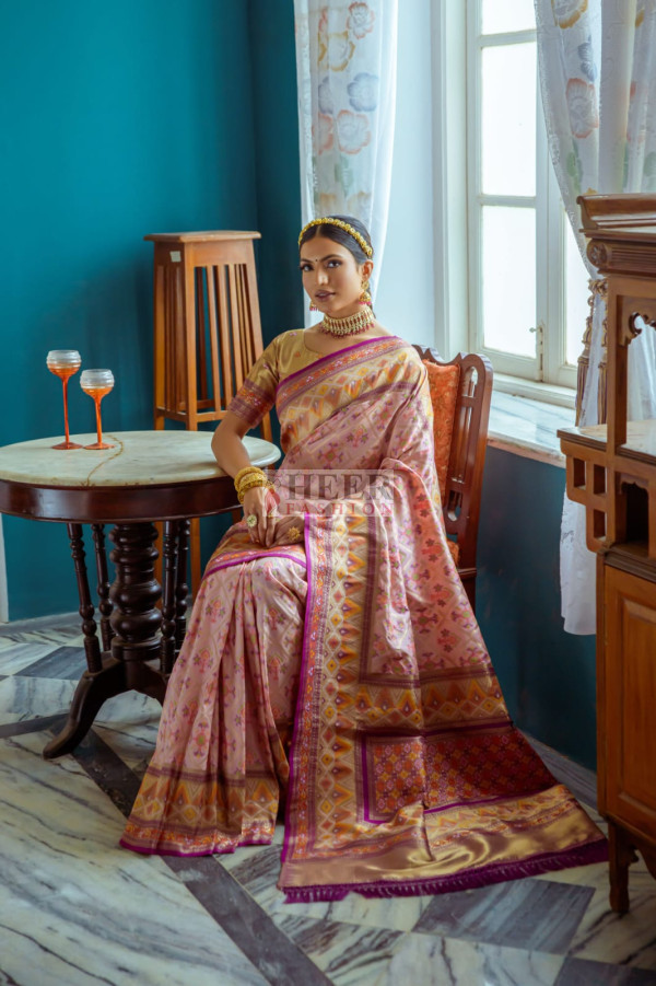Marvelous Green Woven Zari & Printed Patola Silk Traditional Saree main image 1