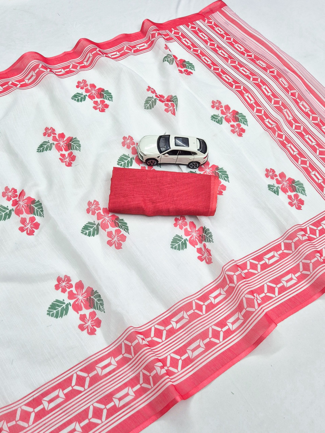 Color Coded Instruments Red and white color soft linen cotton saree with digital floral printed ...