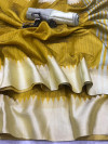 Mustard yellow color raw silk saree with lining pallu