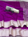 Magenta color raw silk saree with lining pallu