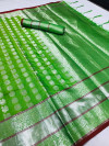 Parrot green color lichi silk saree with zari weaving work