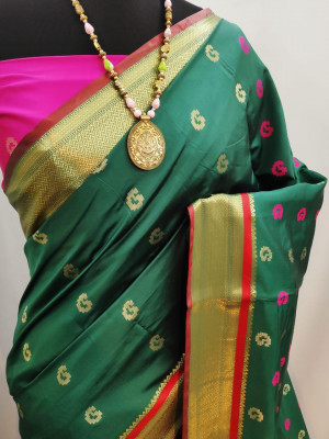 Dark green color paithani silk weaving work saree