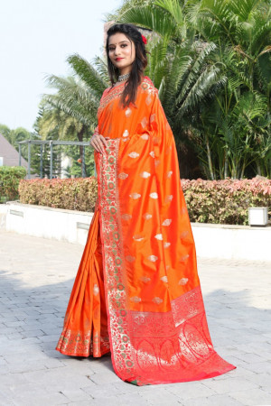 Orange color banarasi soft silk saree with weaving work