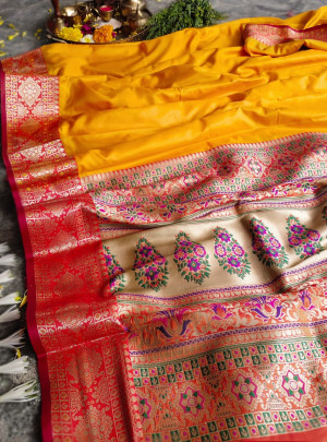Yellow color banarasi silk saree with weaving work