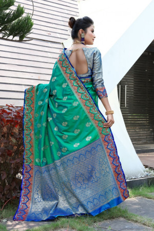 Rama green color banarasi soft silk saree with weaving work
