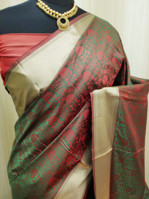 Mehndi green color soft satin silk saree with zari woven work