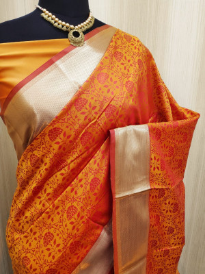 Orange color soft satin silk saree with zari woven work